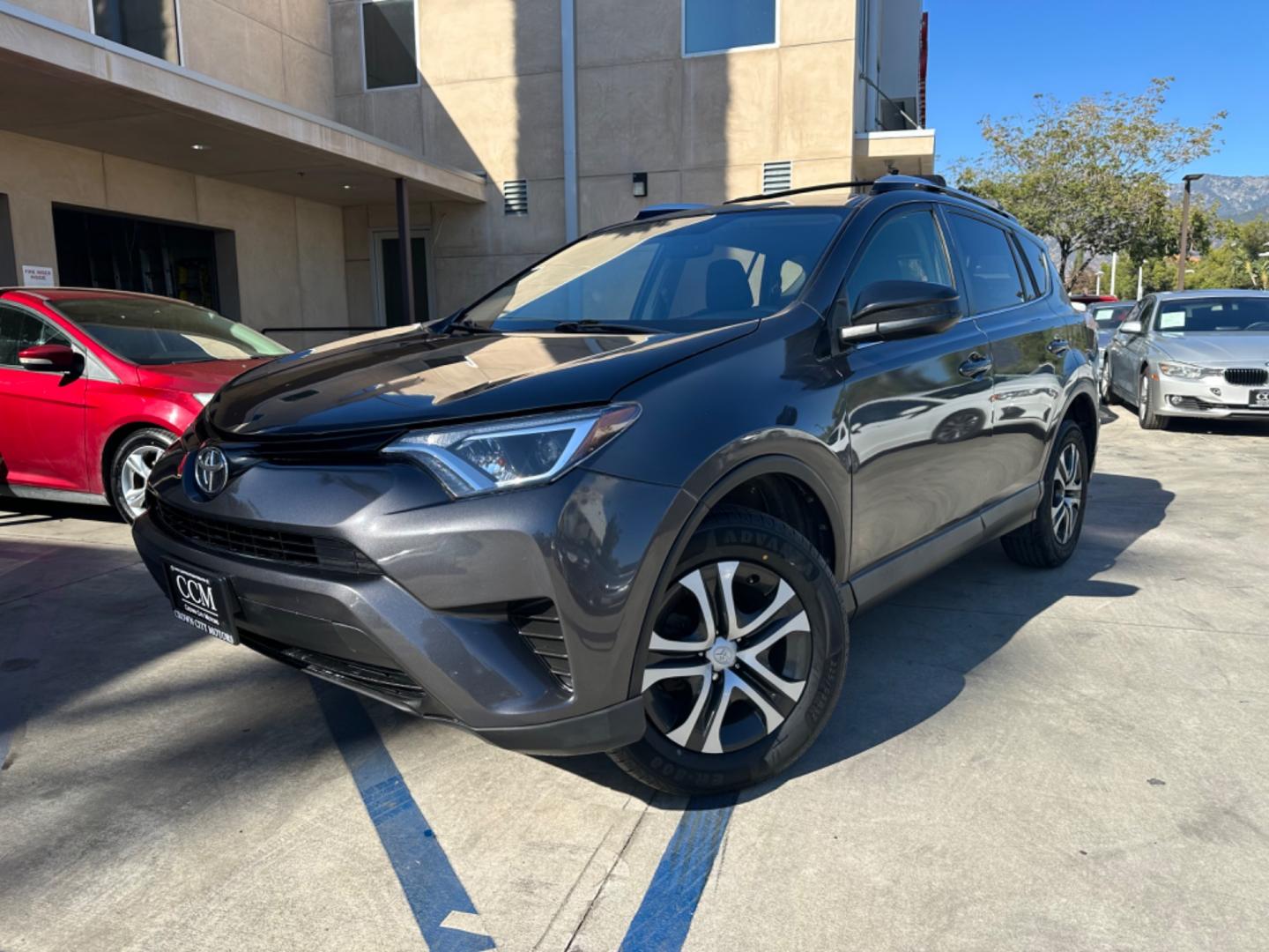 2016 Gray /Black Toyota RAV4 (JTMZFREVXGJ) , AUTOMATIC transmission, located at 30 S. Berkeley Avenue, Pasadena, CA, 91107, (626) 248-7567, 34.145447, -118.109398 - Photo#0